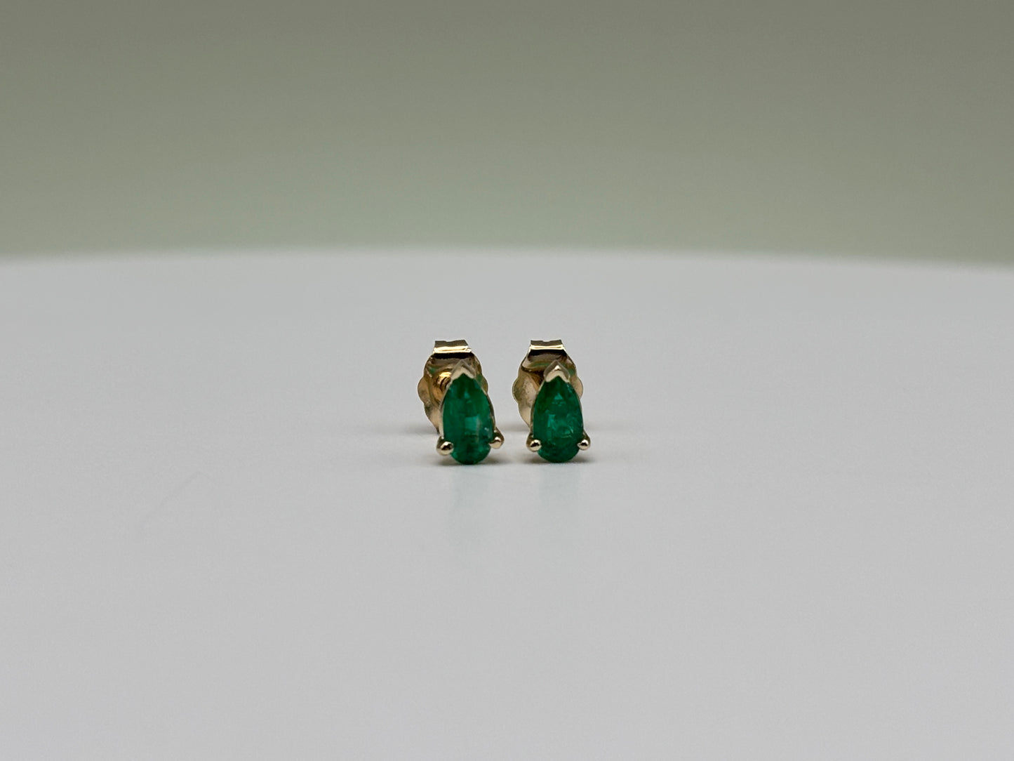14k Yellow Gold Elongated Pear-Cut Colombian Emerald Stud Earrings - 0.36 cttw