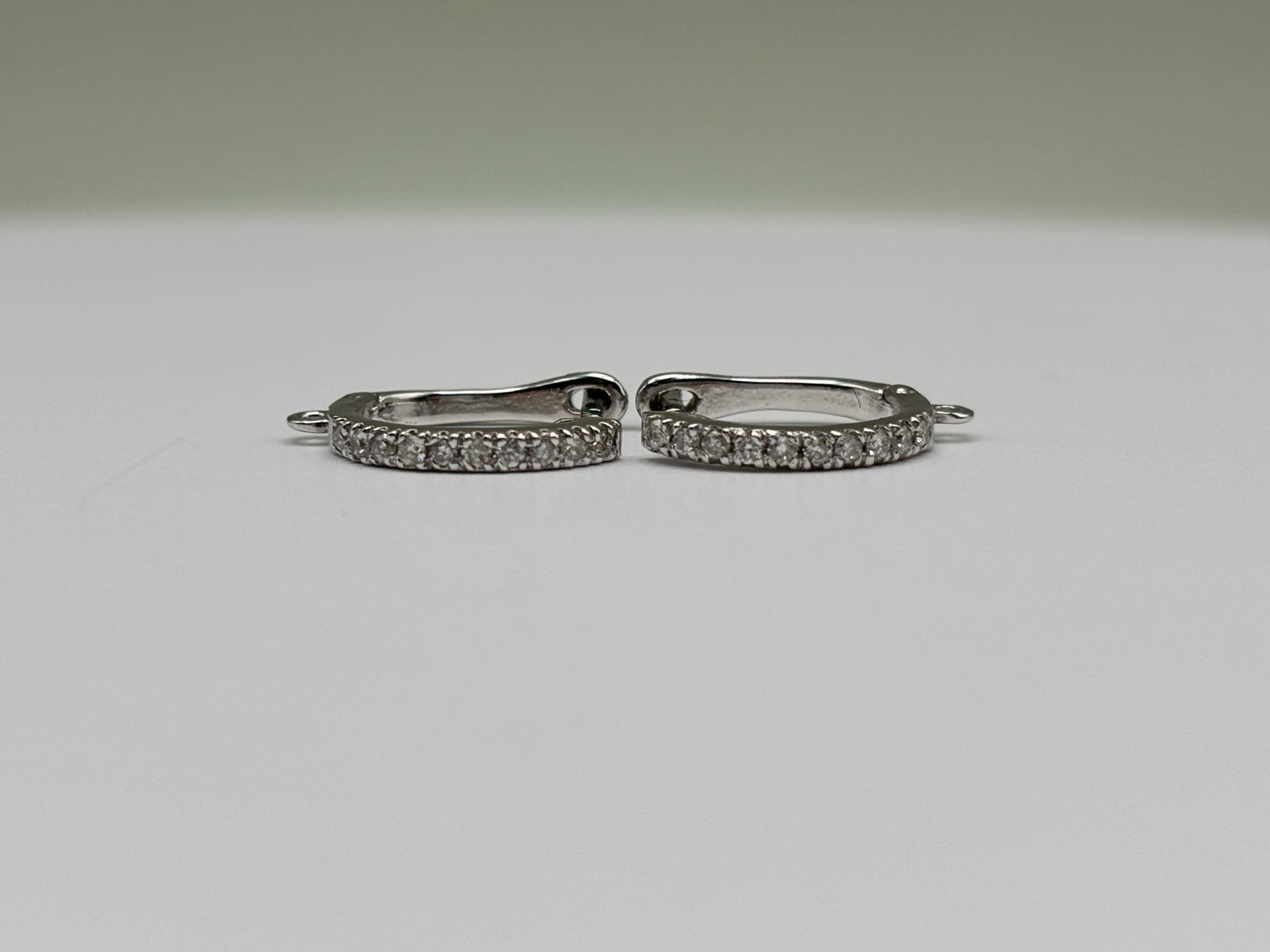 14k White Gold Diamond Huggie Earrings - 0.30 cttw