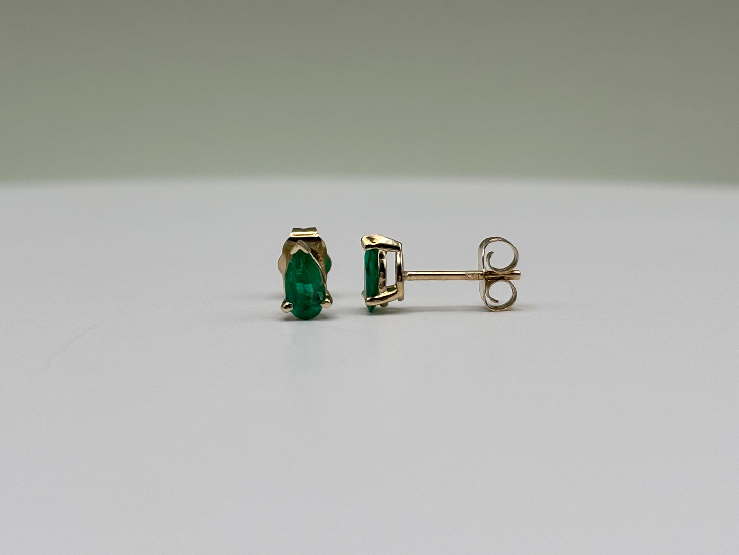 14k Yellow Gold Elongated Pear-Cut Colombian Emerald Stud Earrings - 0.36 cttw