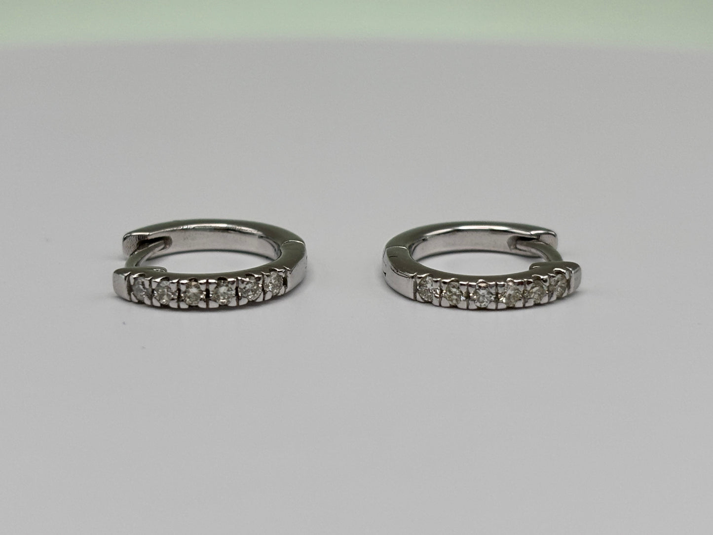 14k White Gold Diamond Huggie Earrings - 0.30 cttw